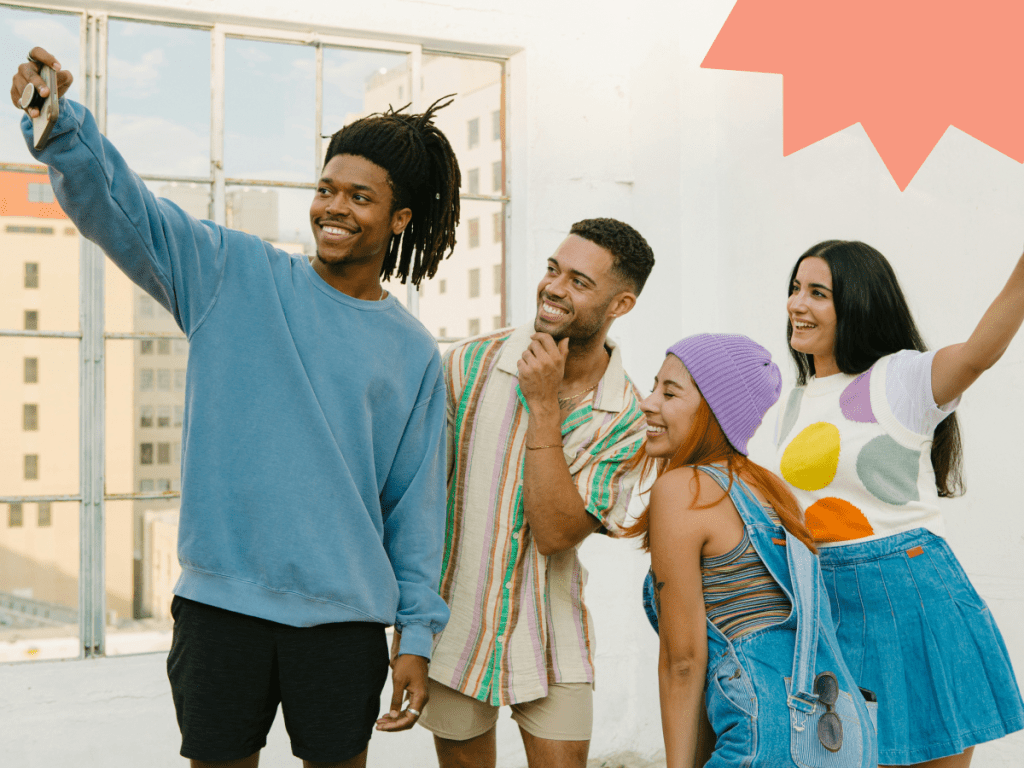 A diverse group of Gen Z friends smiling and taking a selfie on a rooftop, symbolizing authentic friendship, social connection, and positive digital community.